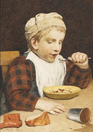 A young boy eating